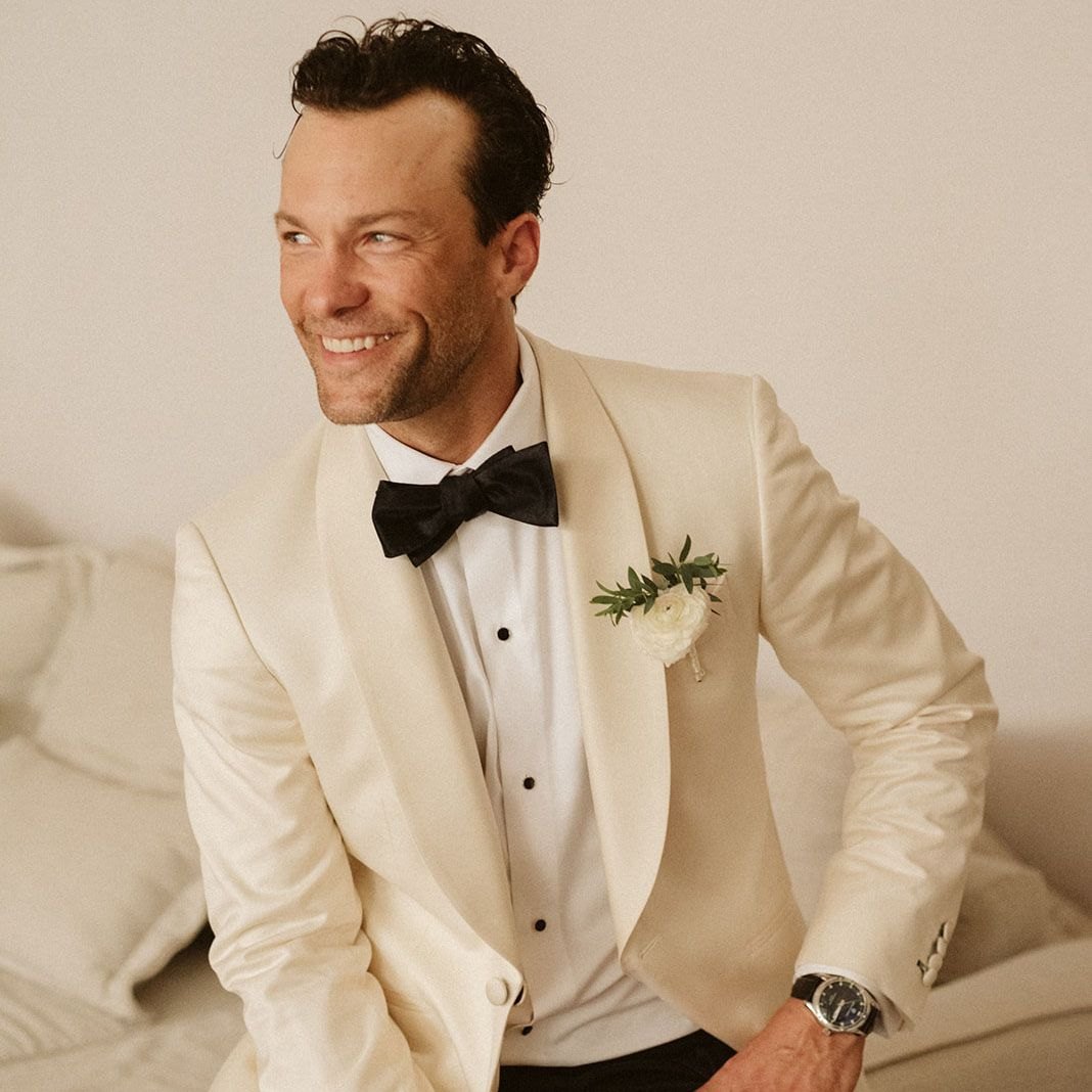 A groom in a wedding suit